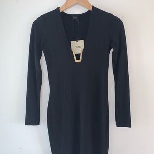Black bodycon dress with gold detail in front